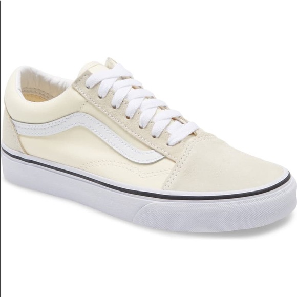 cream and white vans